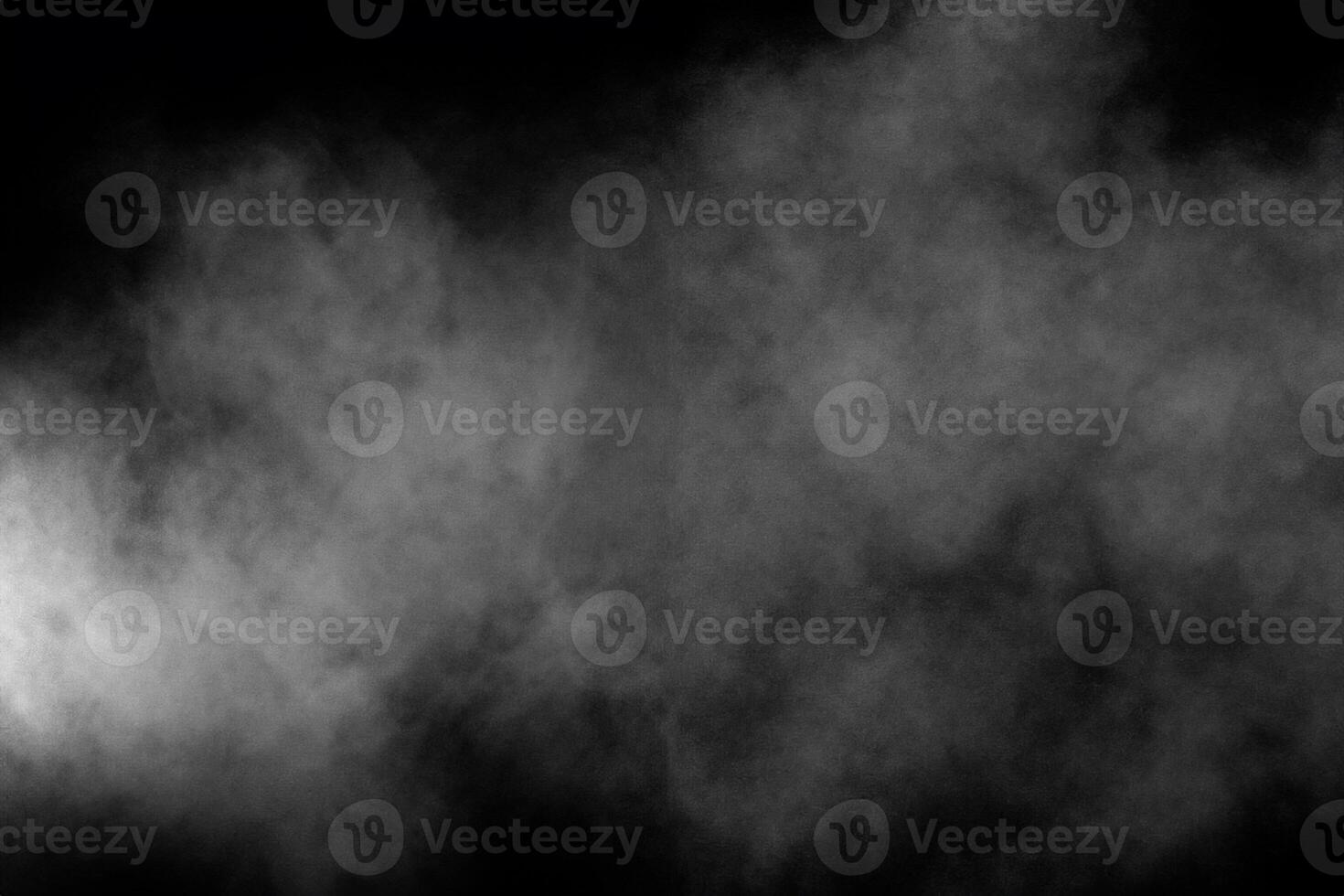 abstrakt vitt pulver explosion på en svart background.freeze rörelse av vitt pulver stänk. foto