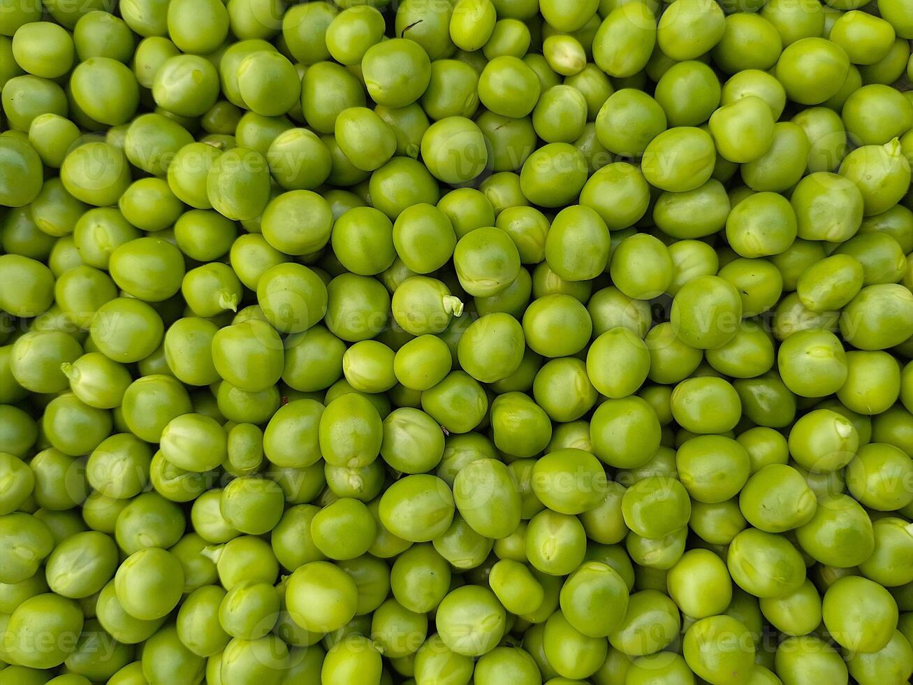 färsk grön ärtor mattar frön, ärtor vegetabiliska topp bakgrund foto