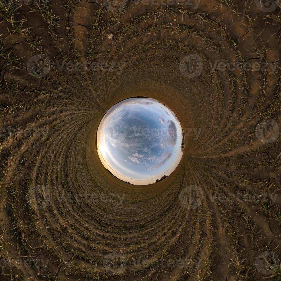 blå hål sfär liten planet inuti sand runda ram bakgrund foto