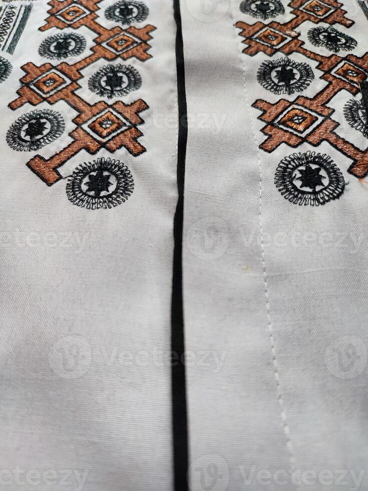 skön arabicum texturer och mönster på muslim kläder foto