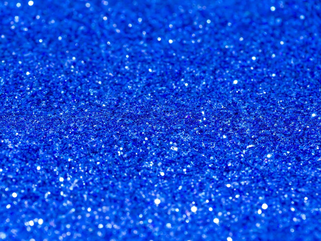 blå gnistrande glitter bokeh bakgrund. foto