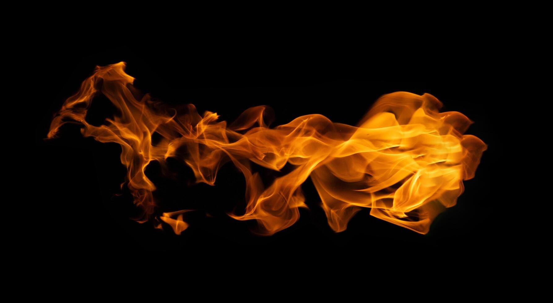 brand och brinnande flamma av explosiv eldkula isolerat på mörk bakgrund för grafisk design begrepp foto