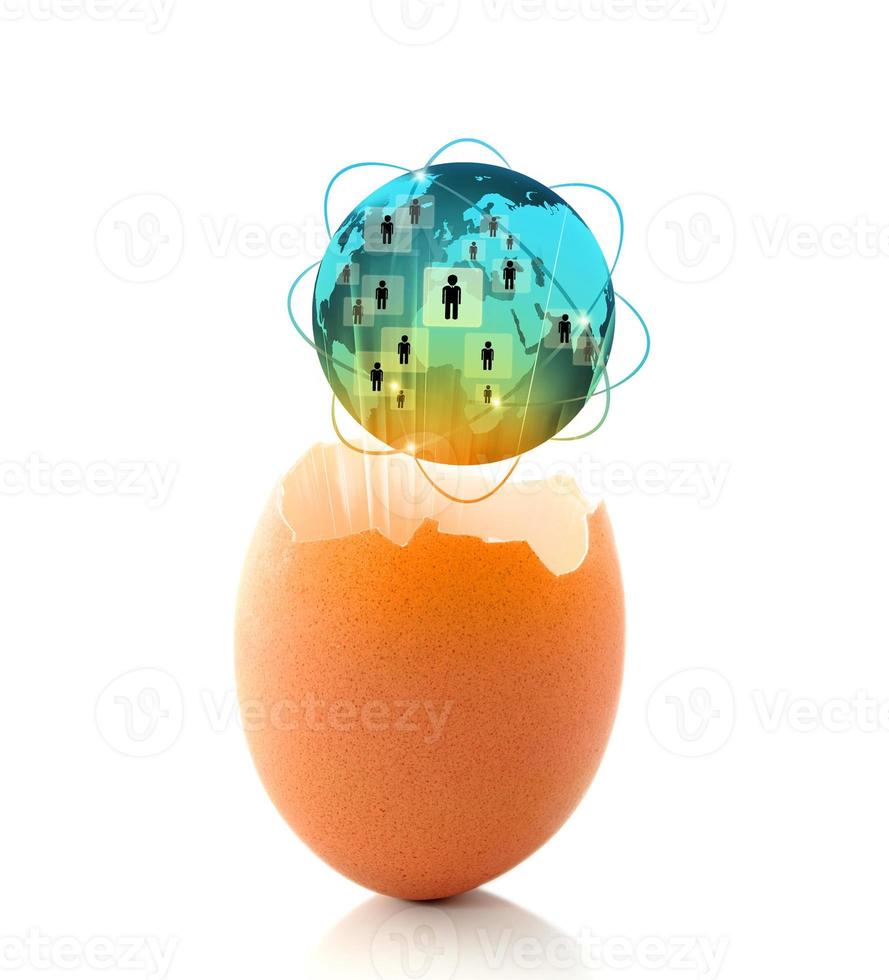 ny världs affärsidé med ett glödande globalt ägg foto