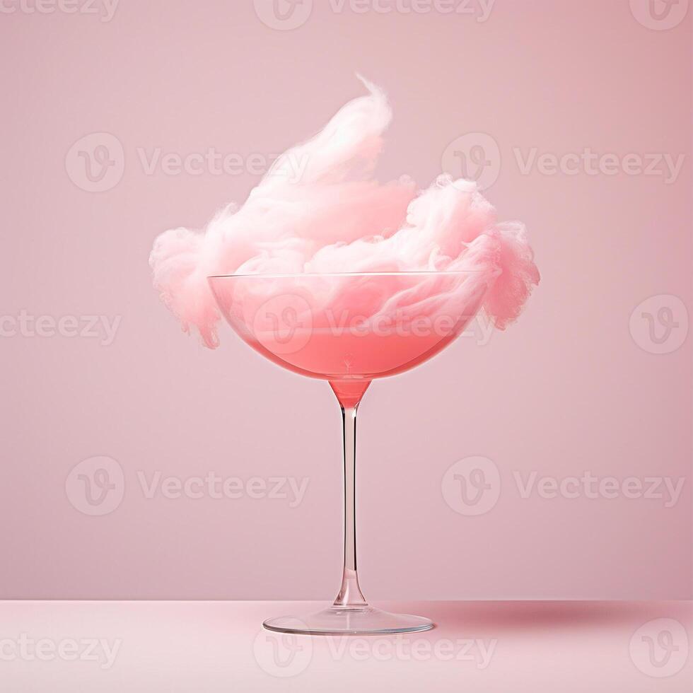 ai genererad bomull godis i en glas med en rosa cocktail foto