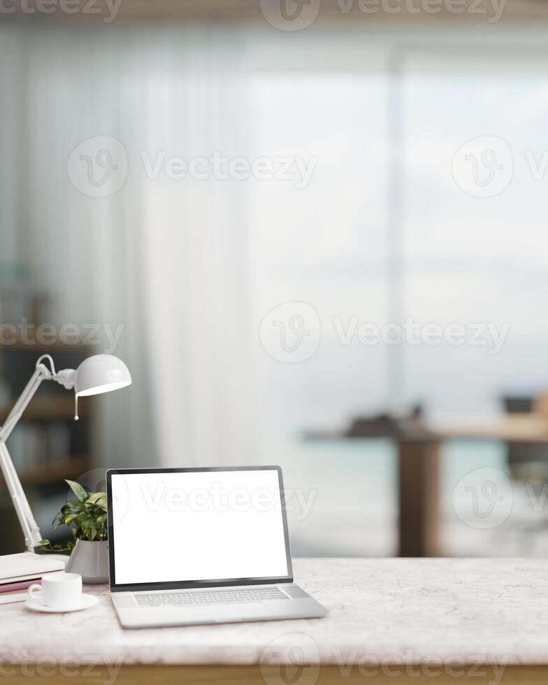 en modern Hem kontor med en bärbar dator dator attrapp och Tillbehör på en vit marmor tabell. foto