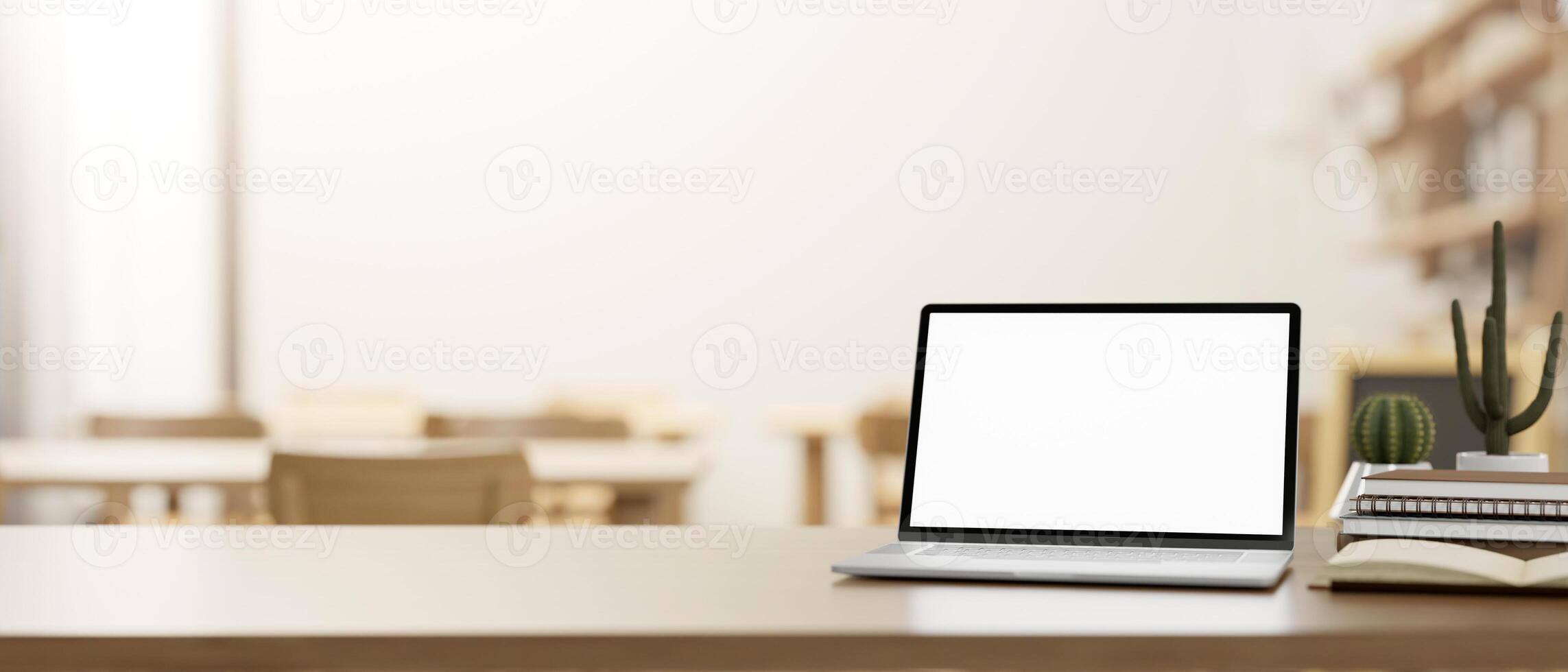 en trä- tabell funktioner en bärbar dator attrapp i en mysigt neutral kaffe affär eller bibliotek sam-arbetande Plats. foto