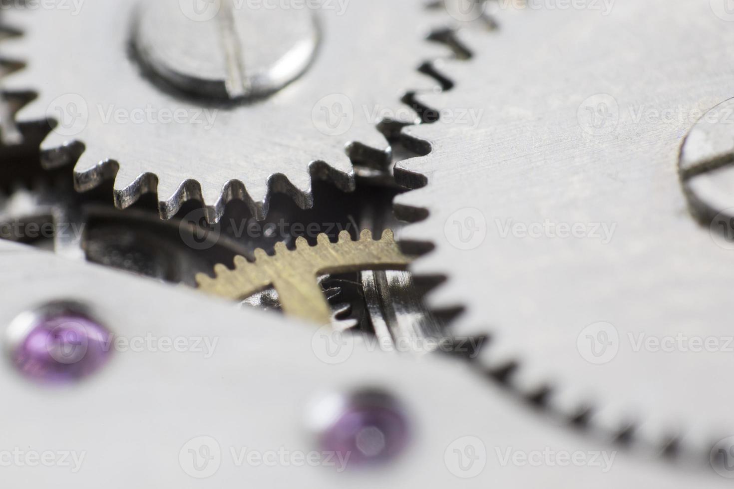 makro detalj av växlarna i mekanismen för ett armbandsur foto