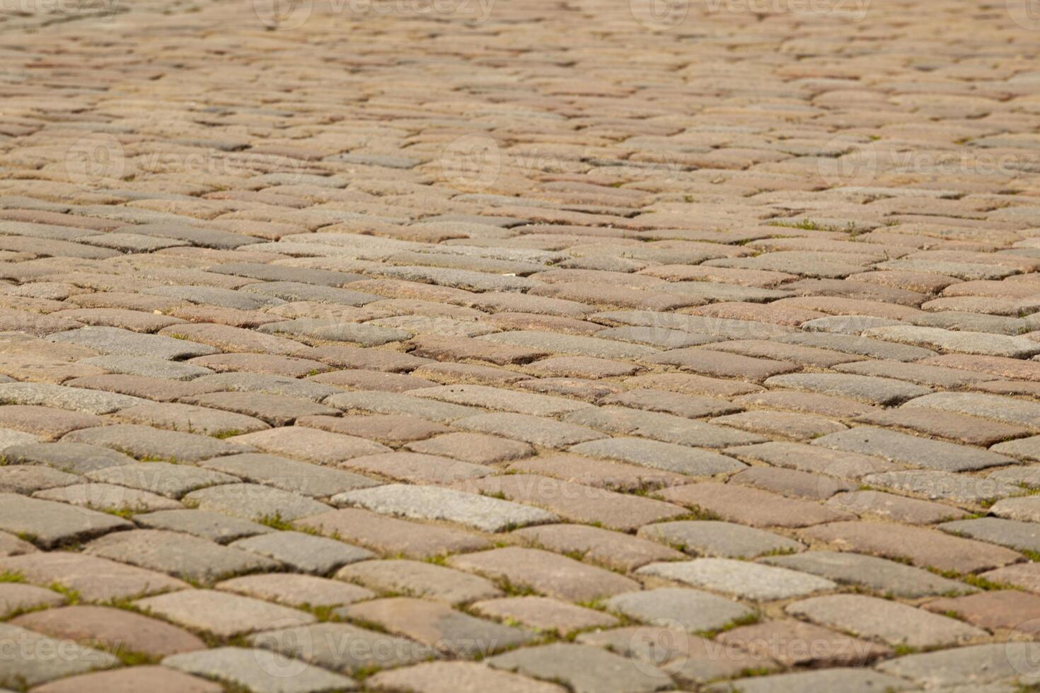 gata trottoar textur i kakel. grå rektangulär gammal kakel. för text. bakgrund. horisontell. foto
