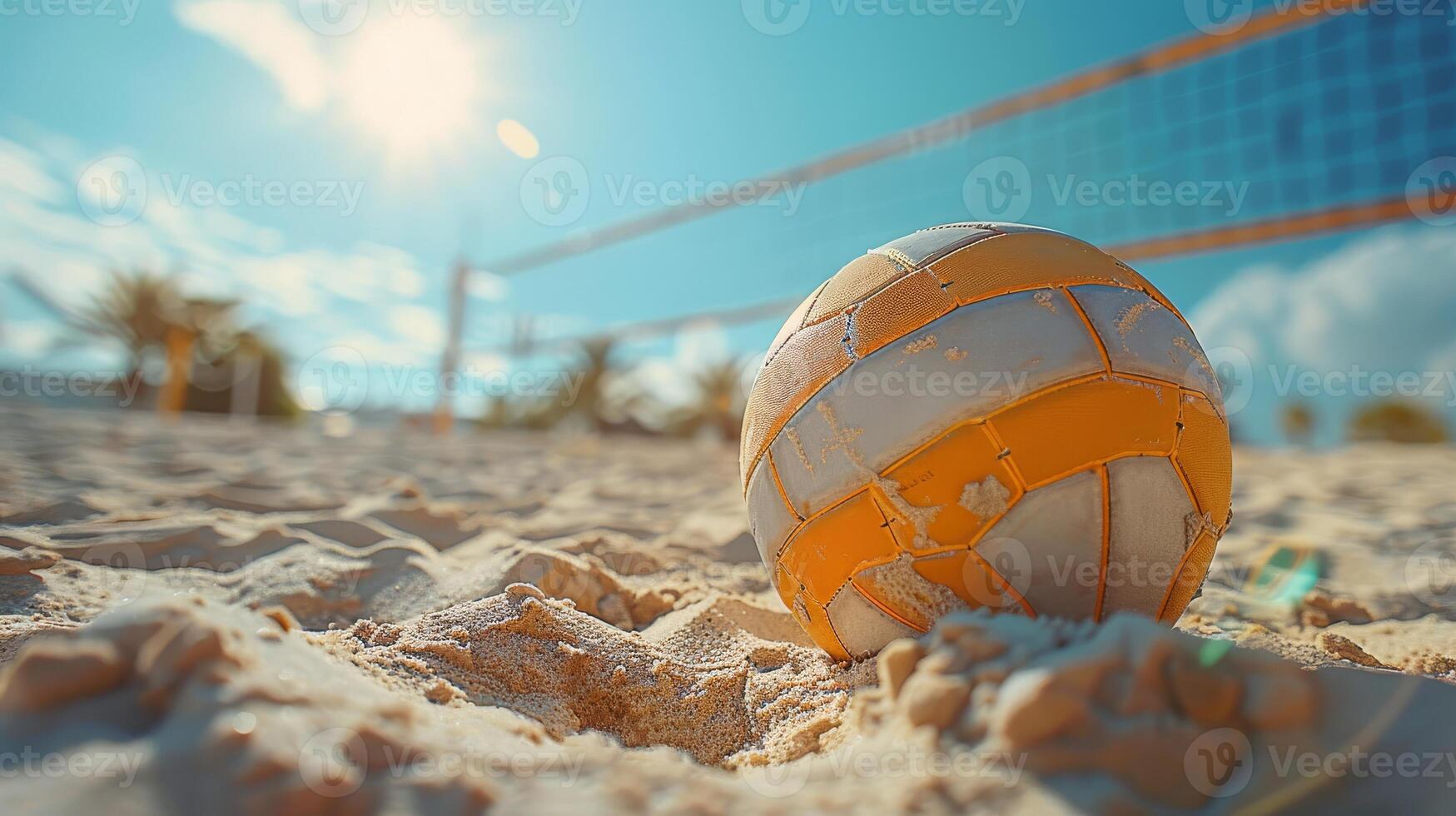 strand volleyboll liggande på de sand med de netto i bakgrund. aktiva sommar semester, olympic spel foto