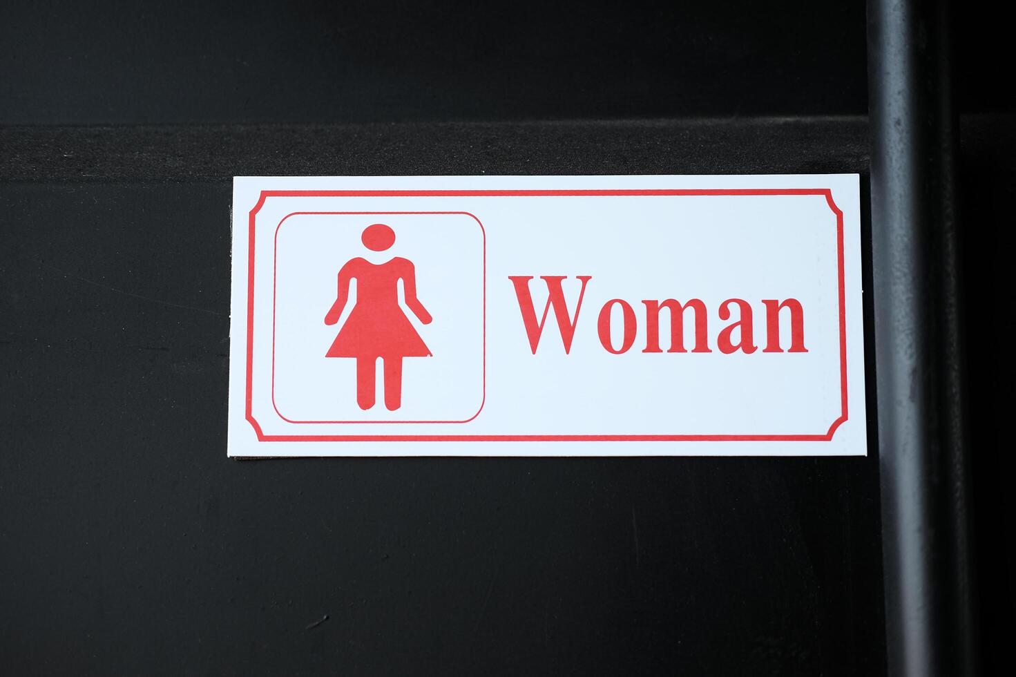 kvinna toalett tecken och symboler foto