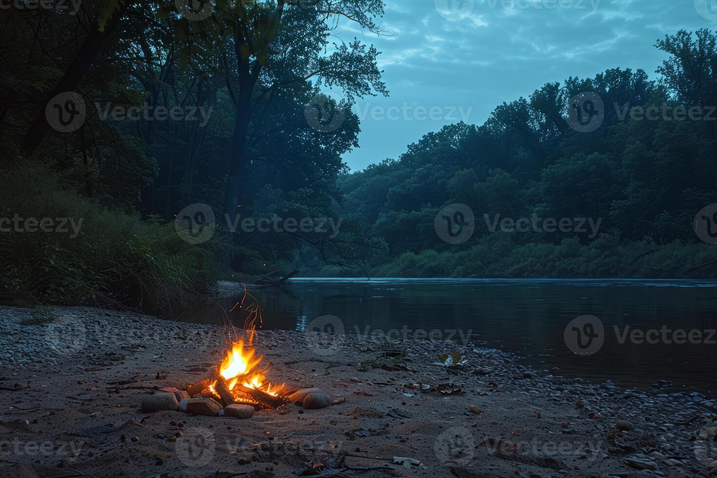 fredlig flodstrand campingplats upplyst förbi de flimmer ljus av lägereld foto