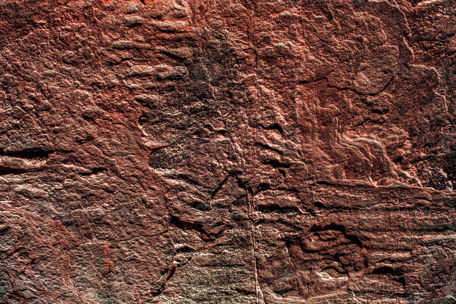 brun sten sten textur isolerade och enorm samling av granit stenar bakgrund foto