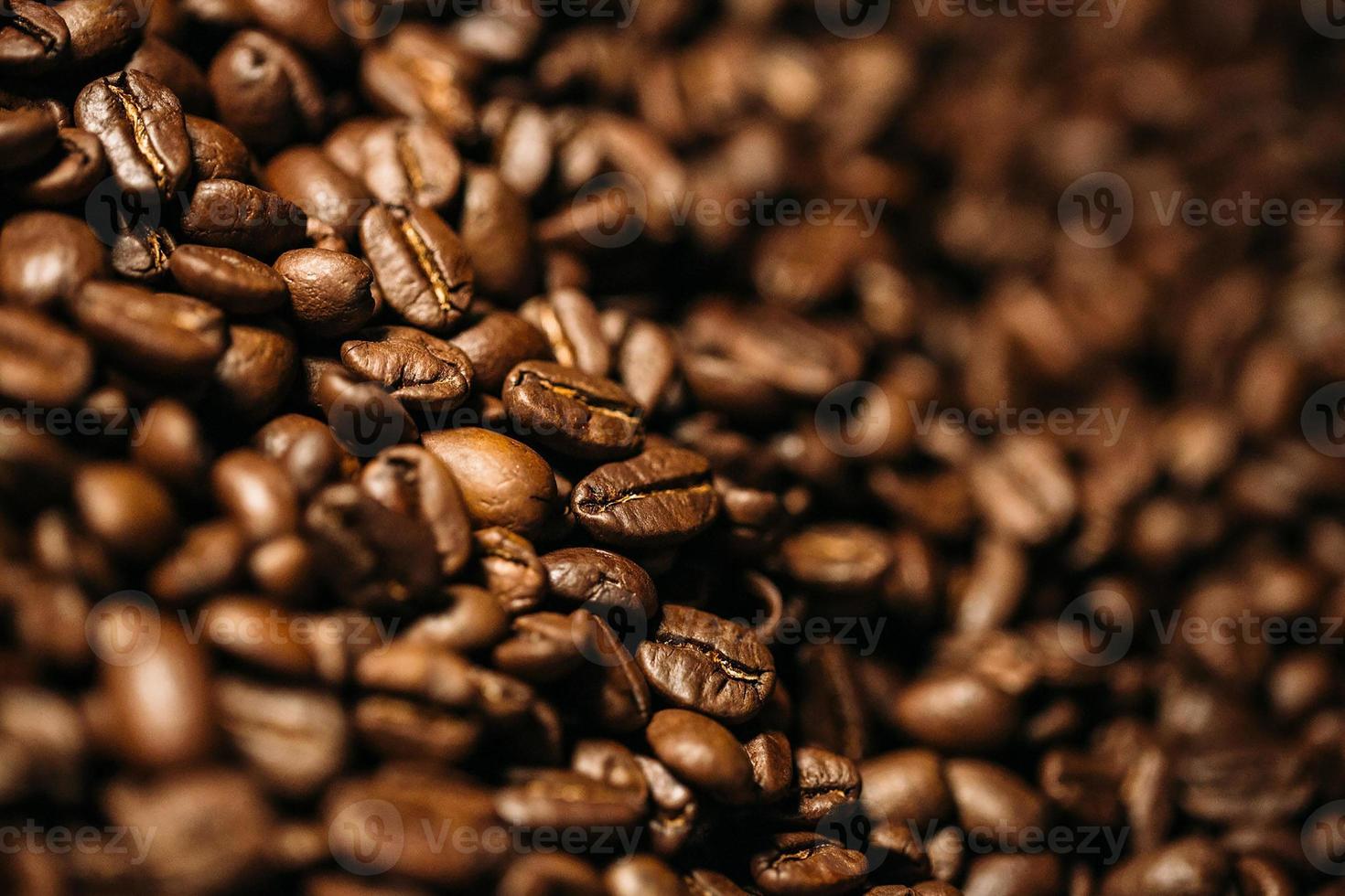 kaffebönor i stora mängder med rörelseoskärpa foto