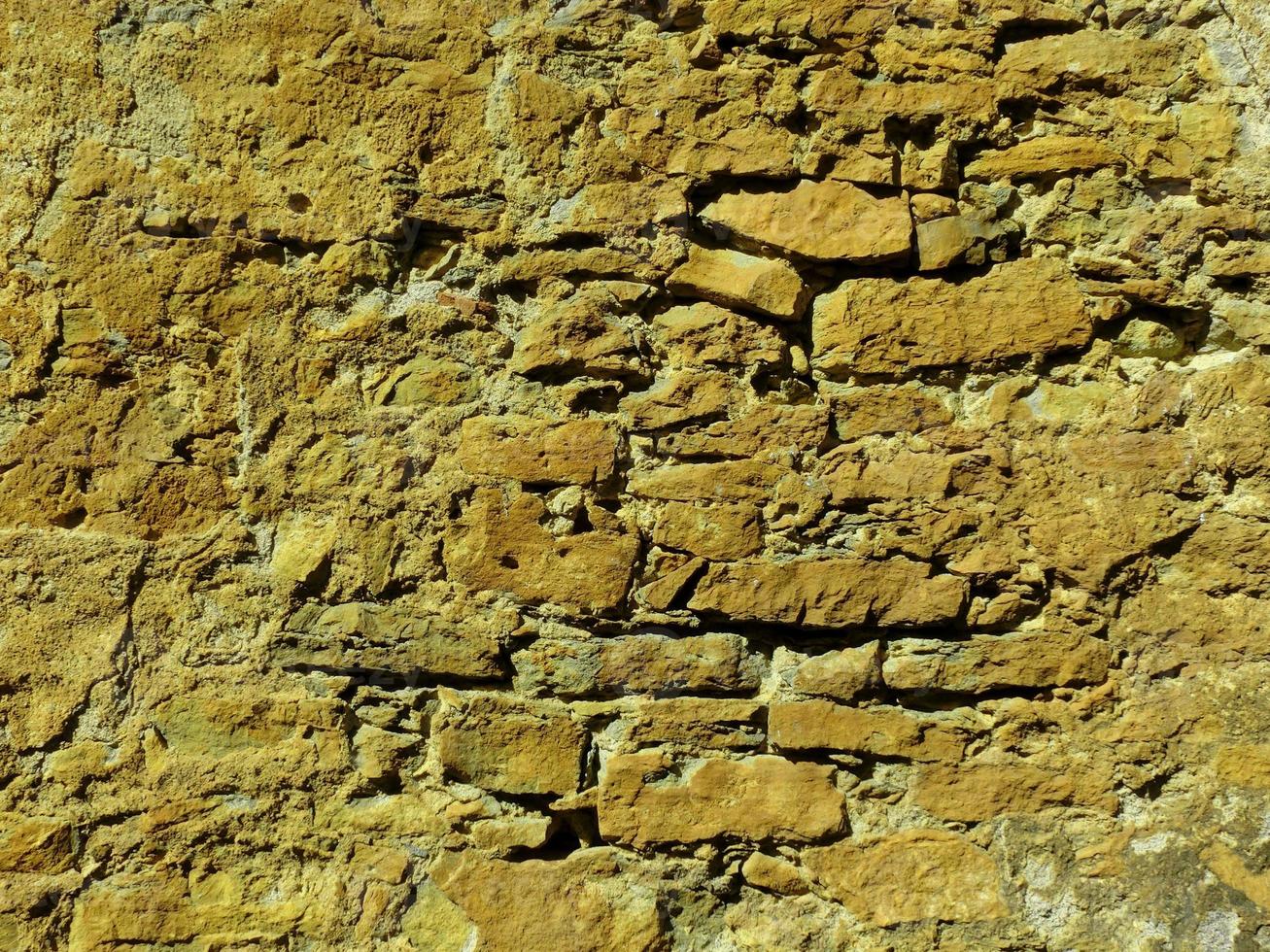 stenmur perfekt organiserad, ljusgrön textur från bergväggsbakgrundsstruktur foto