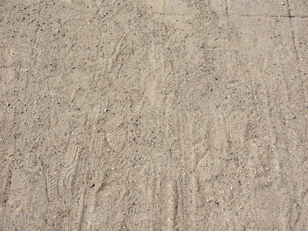fotspår i sandbakgrunden foto