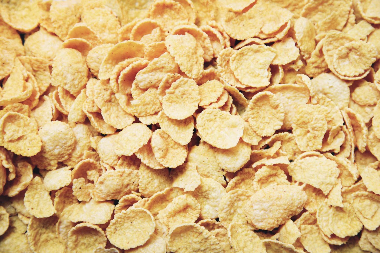 cornflakes textur bakgrund ovanifrån - frukostflingor foto