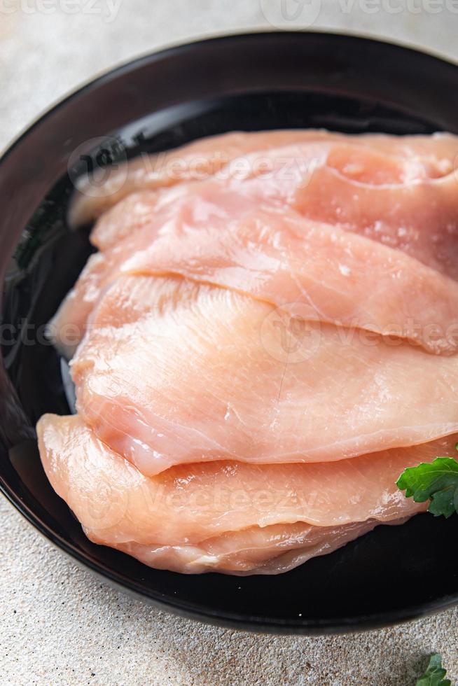 kycklingbröst skivor färskt kött fjäderfä mat bakgrund foto