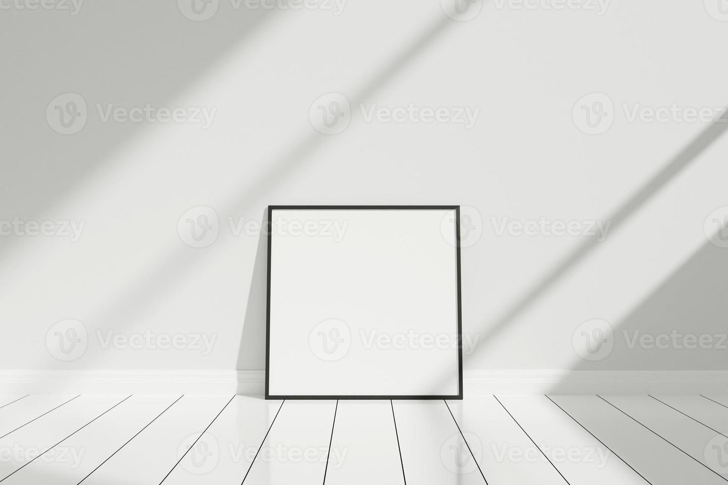 minimalistisk och ren fyrkantig svart affisch eller fotoram mockup på golvet lutad mot rumsväggen med skugga foto