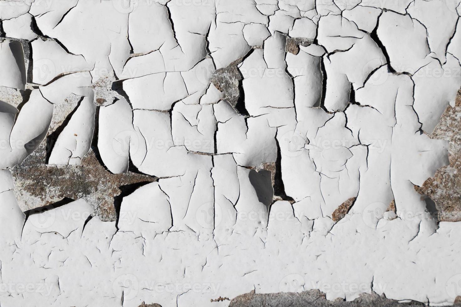 vit sprucken konsistens. skadad, åldrad och väderbiten yta. foto
