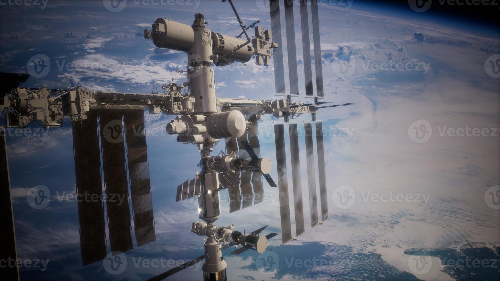 internationella rymdstationen i yttre rymden över planeten jorden foto