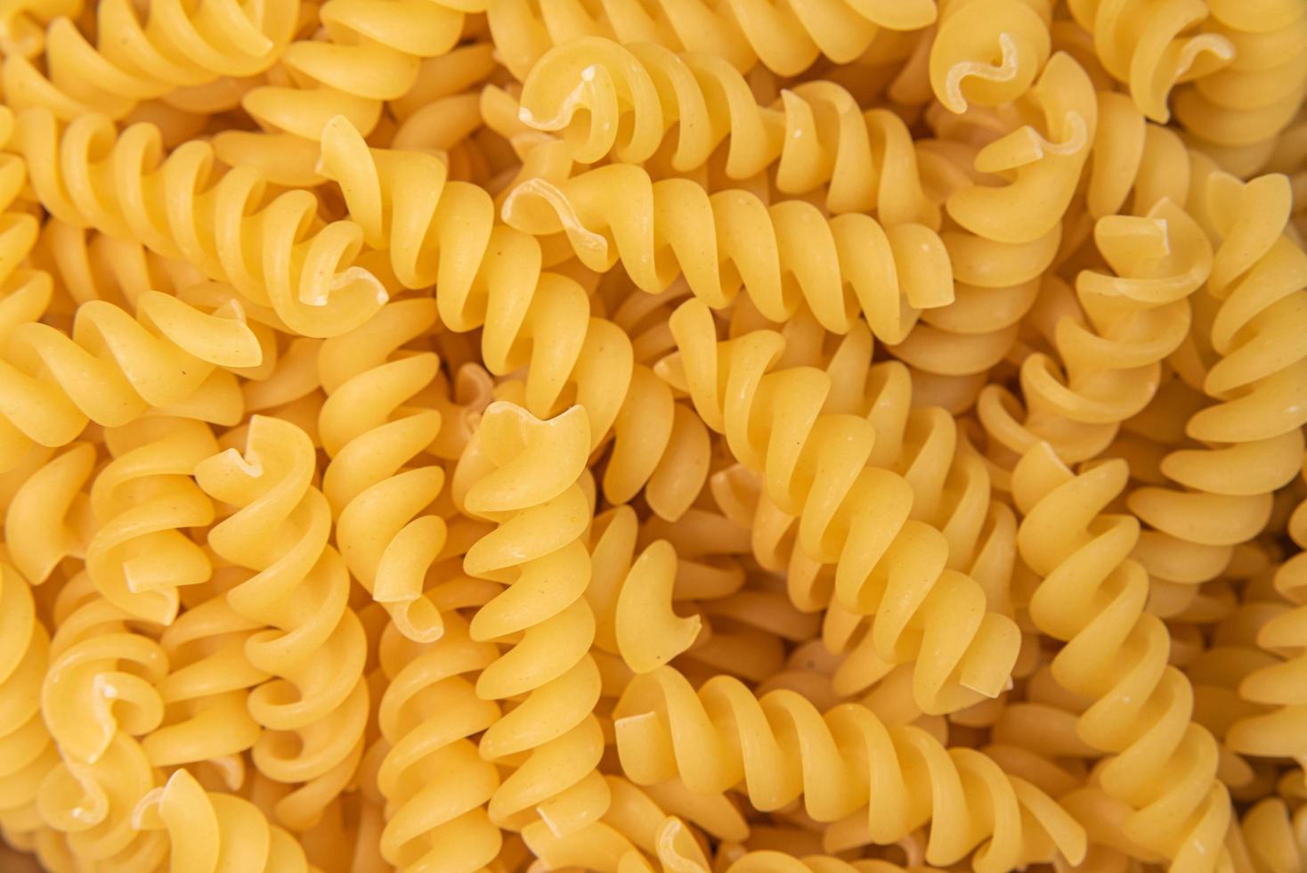 rå pasta - makro detalj - närbild foto