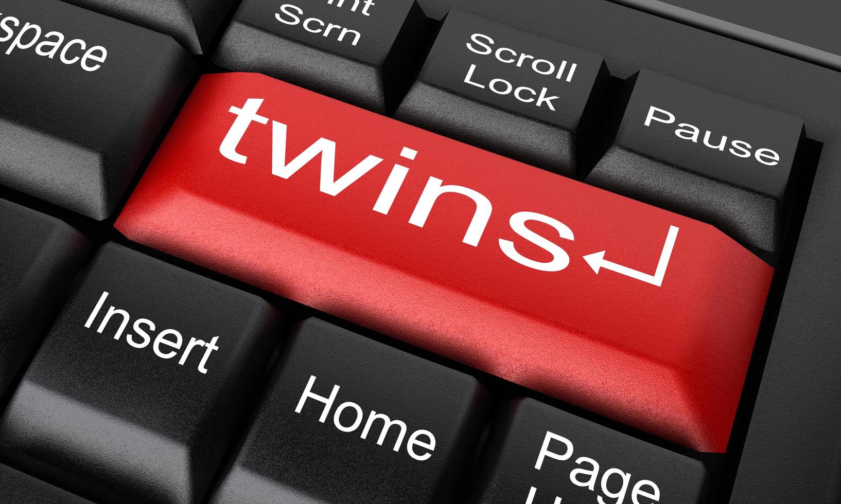 tvillingord på röd tangentbordsknapp foto