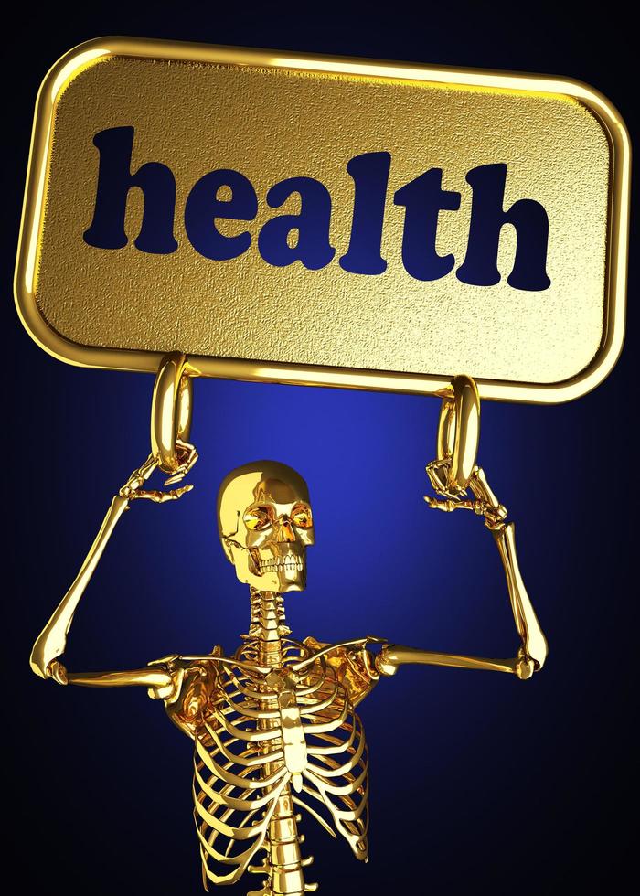 hälsoord och gyllene skelett foto