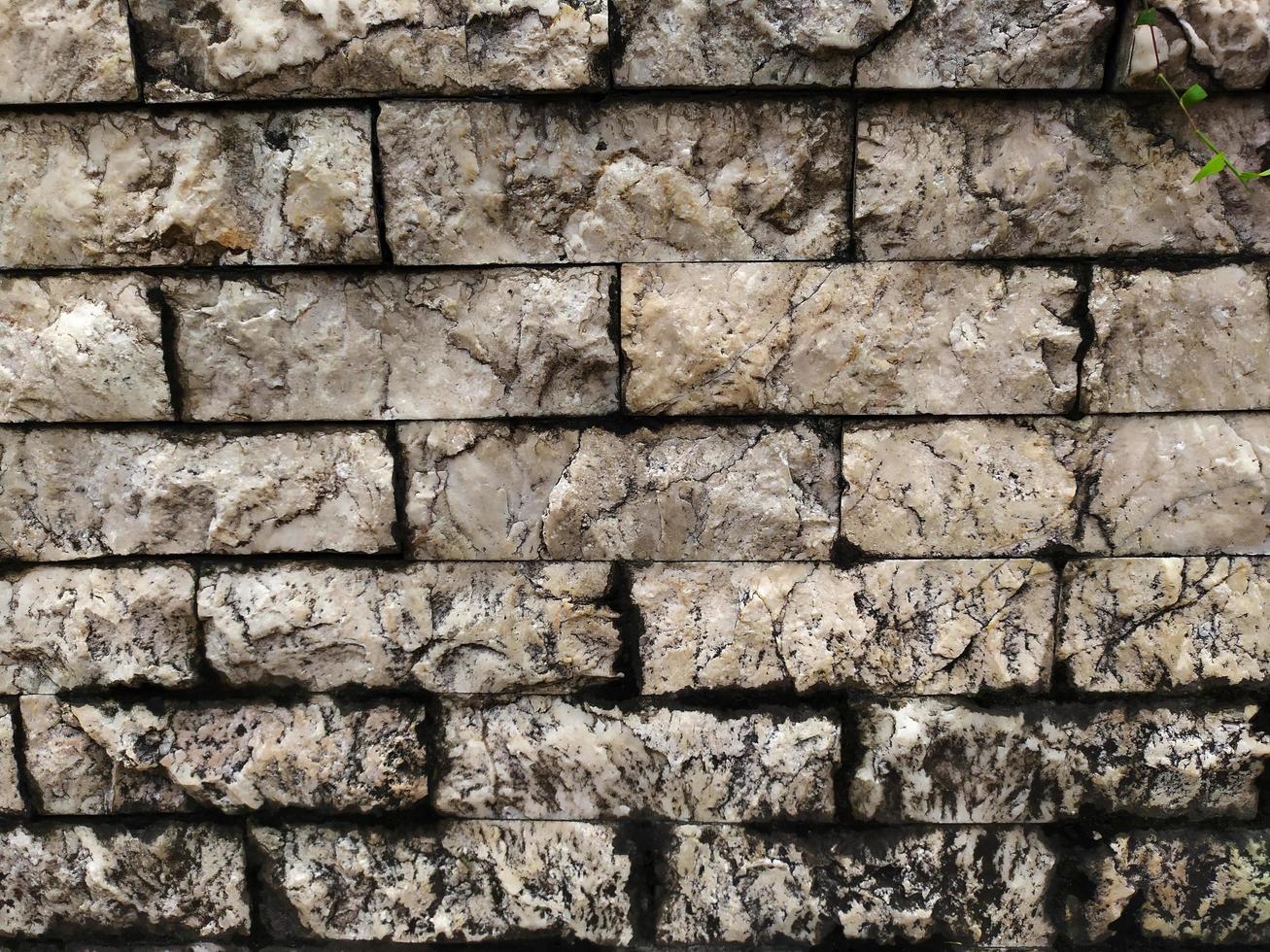 grunge tegelvägg sten mönster bakgrund foto
