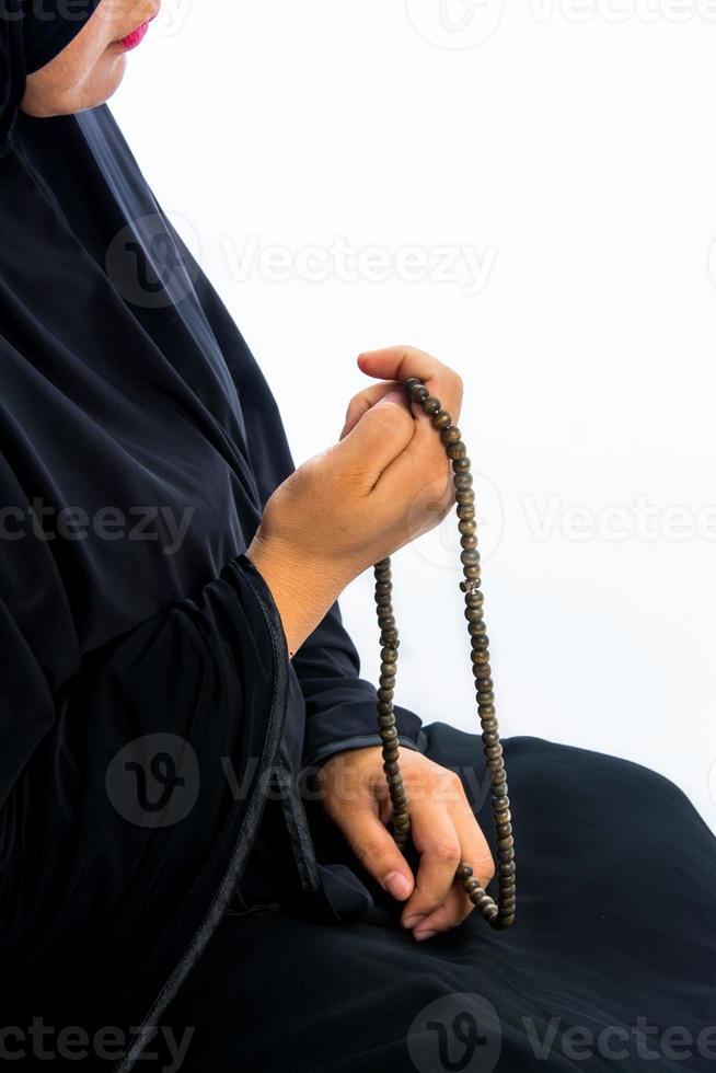 muslimsk kvinna som ber för allah, muslimsk gud foto