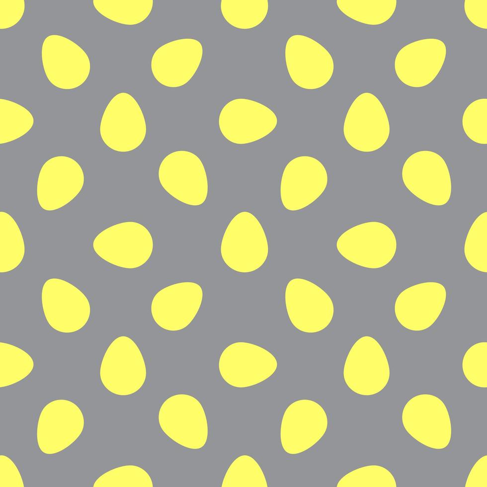 ägg mönster. gula ägg på en grå bakgrund foto