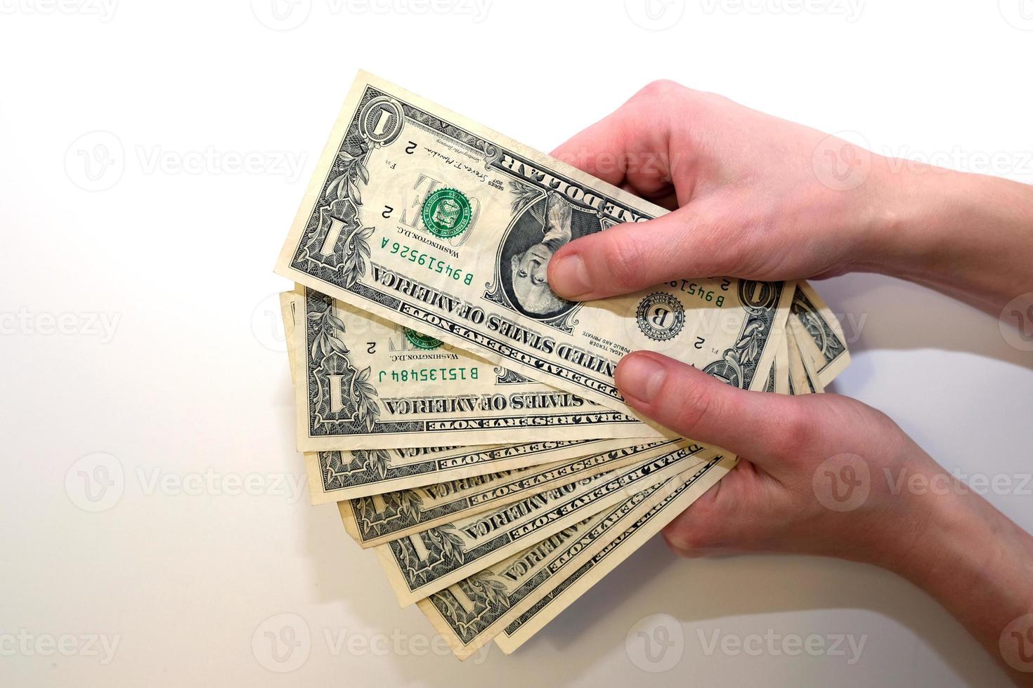 amerikanska dollar i handen foto