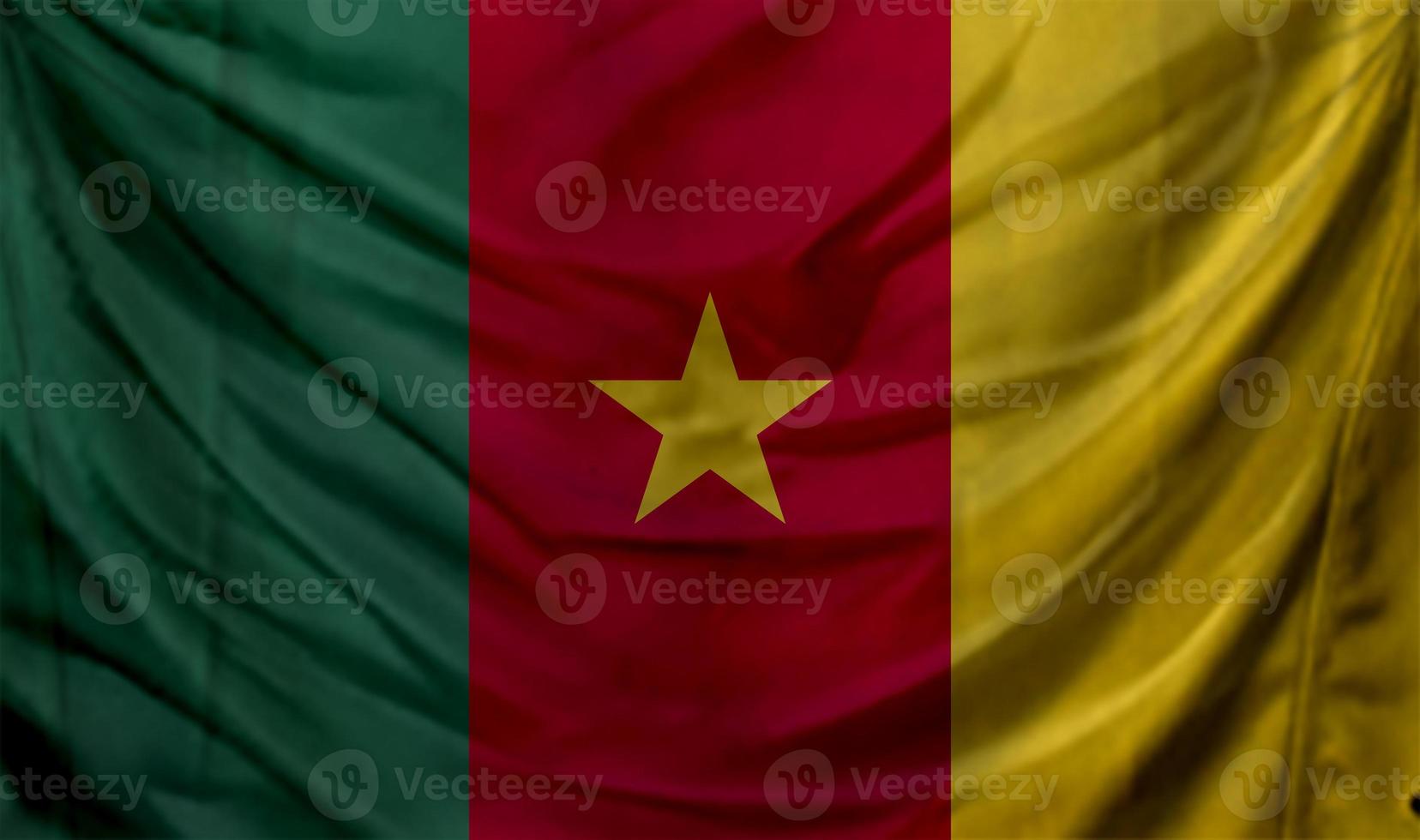 kamerunska flaggan vajar. bakgrund för patriotisk och nationell design foto