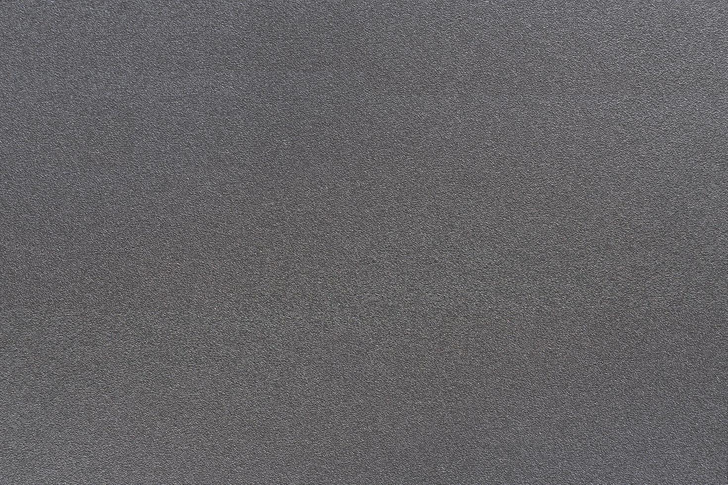 textur av metall mörk svart färg har grov yta, abstrakt bakgrund foto