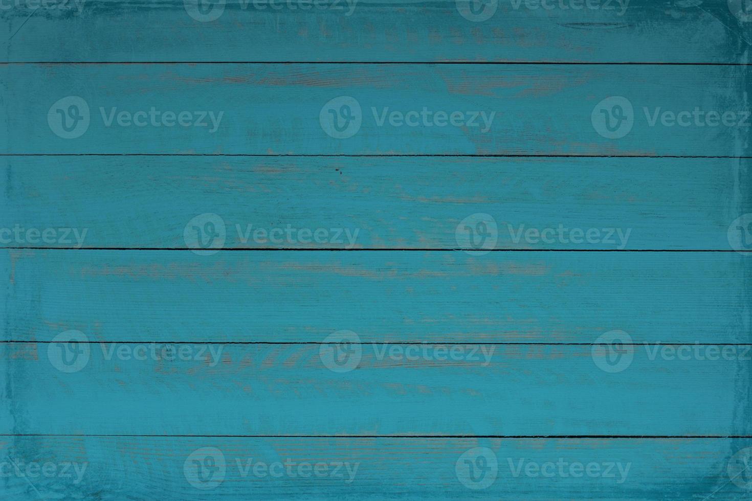 vintage blå trä bakgrundsstruktur med knutar och spikhål. gammal målad trävägg. blå abstrakt bakgrund. vintage mörkblå horisontella brädor i trä. foto