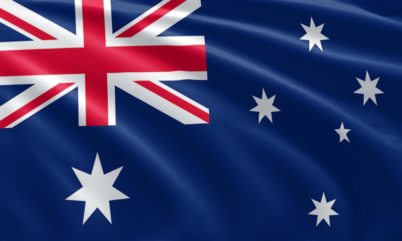 närbild viftar Australiens flagga foto