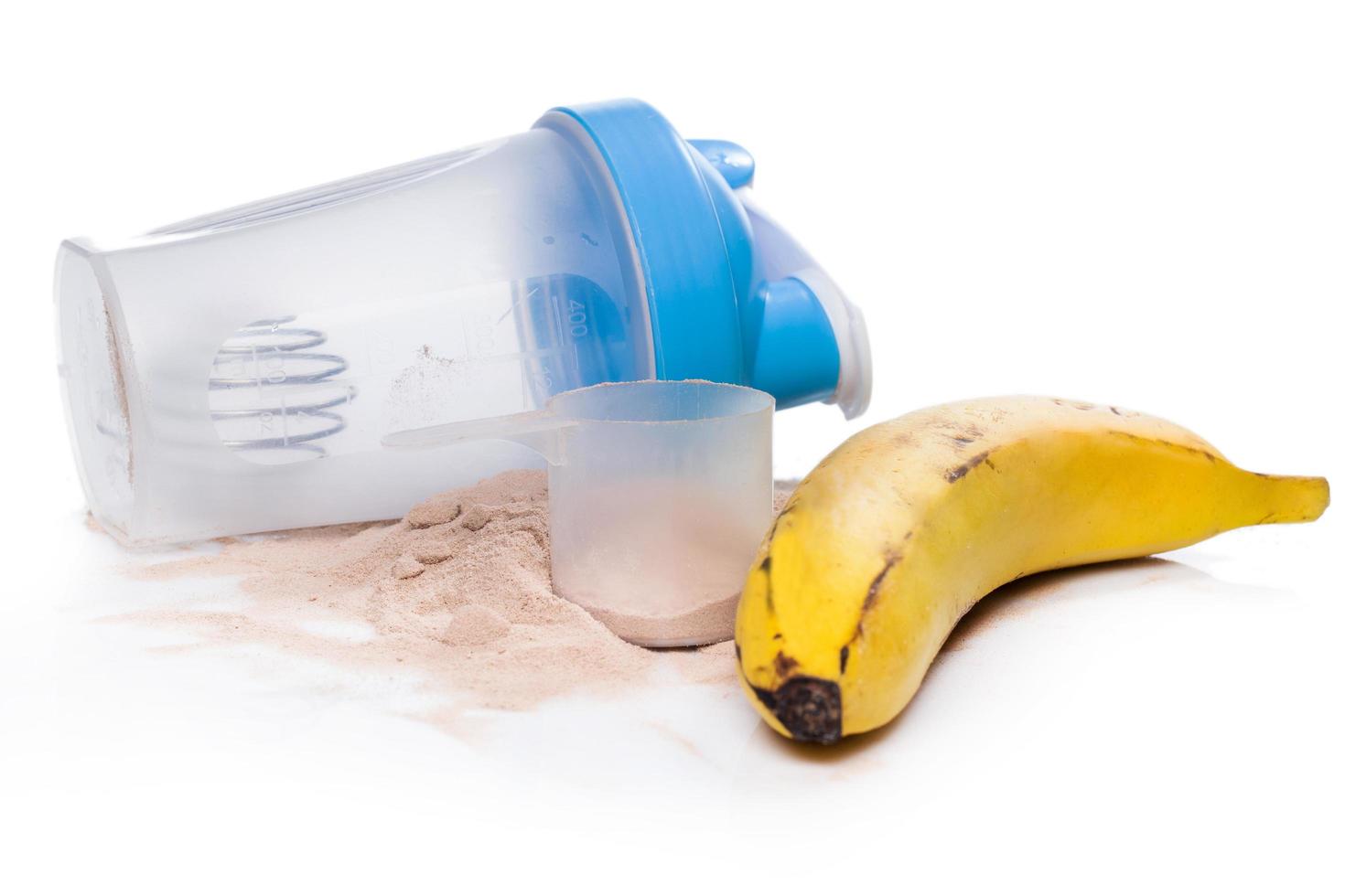 shaker, proteinpulver och banan foto