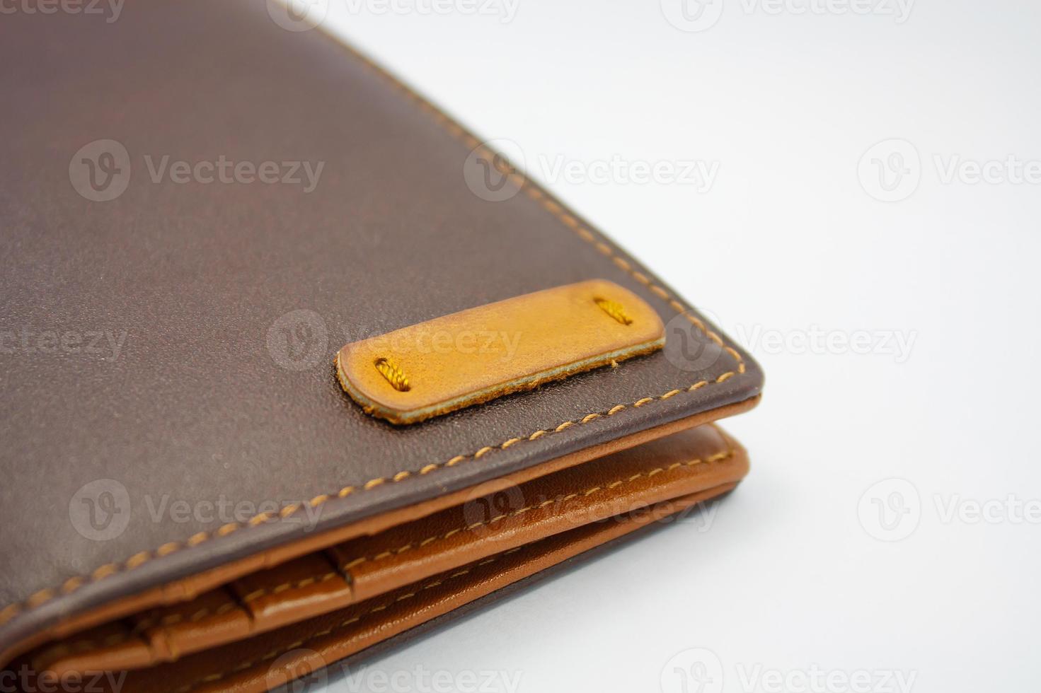 brun läderplånbok foto