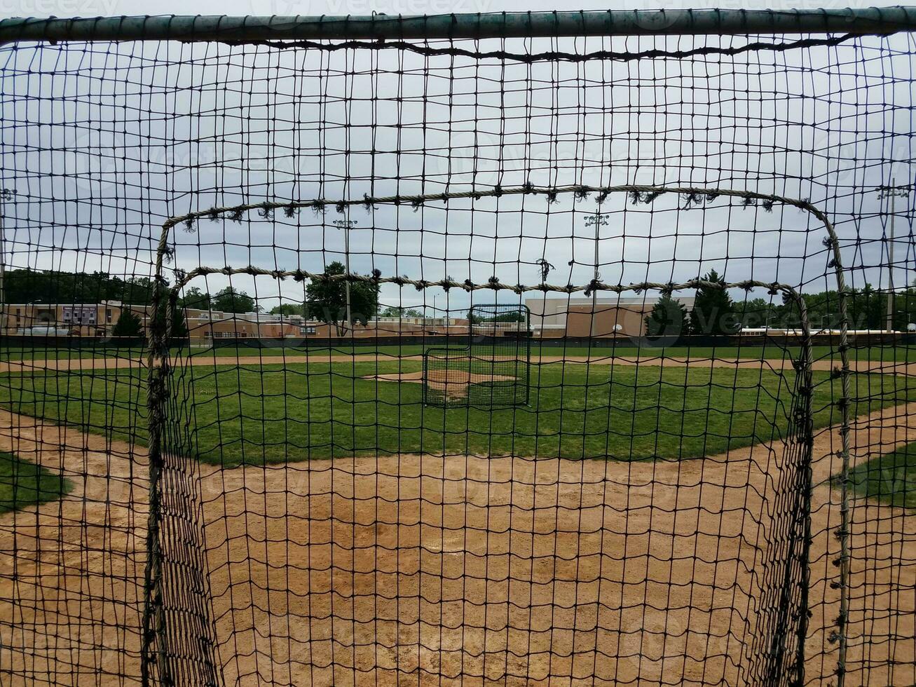 baseball diamant med skyddsnät foto