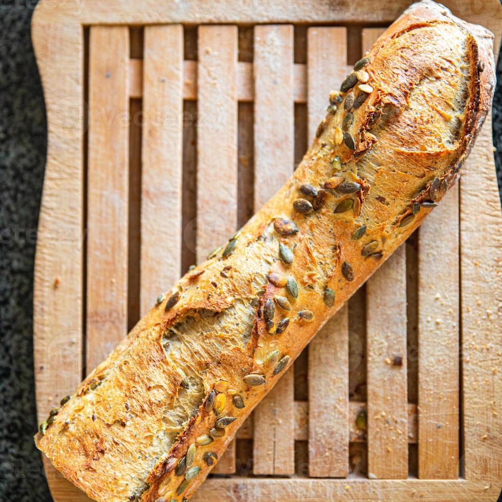 baguette bröd frön fransk färsk måltid mat mellanmål på bordet kopia utrymme mat foto