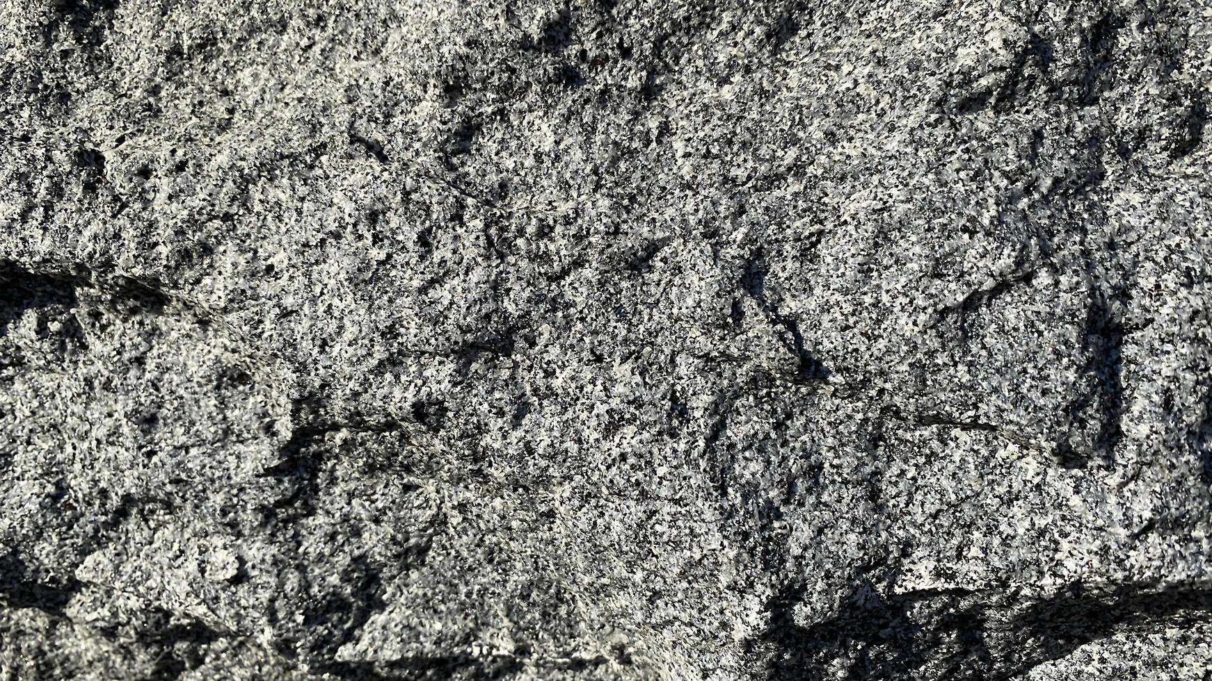 naturlig texturerad bakgrund av grå granit foto