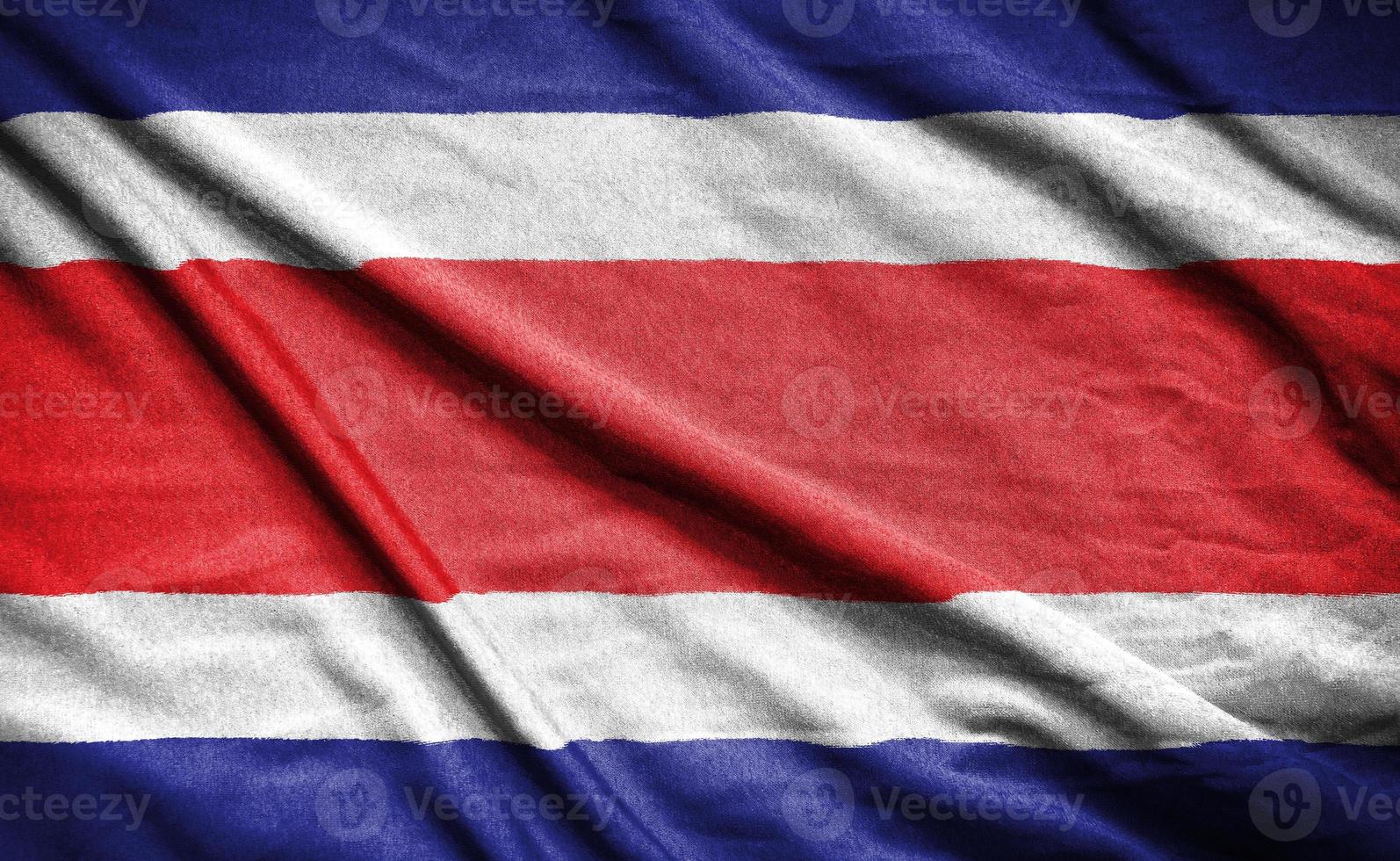 realistisk flagga för costa rica på den vågiga ytan av tyg foto