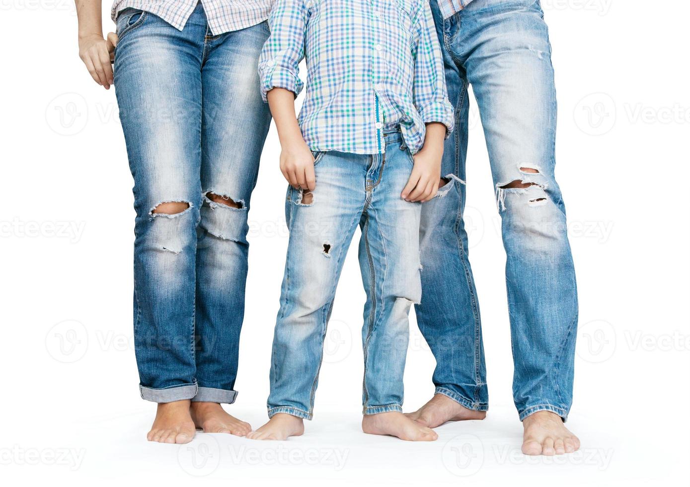 familjben i trasiga jeans foto