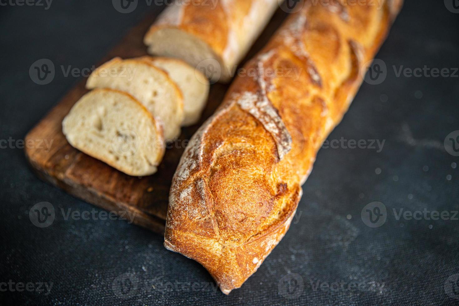 baguette bröd mjuk bulle färsk bageri mat mellanmål på bordet kopia utrymme mat bakgrund rustik ovanifrån foto