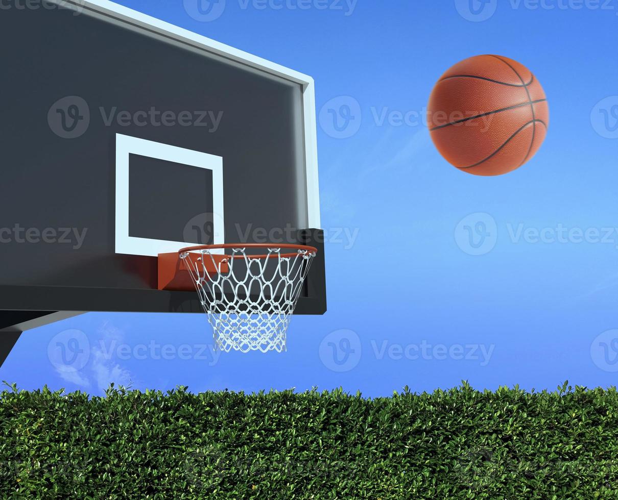 en spelare kastar en basketboll mot nätet och försöker få en poäng foto