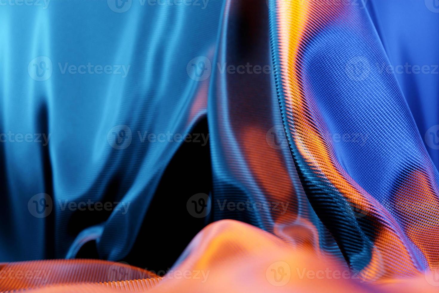 3D-illustration av texturen av ett blått naturligt tyg med veck. abstrakt bakgrund från naturligt vackert tyg närbild. röda gardiner, scengardin foto
