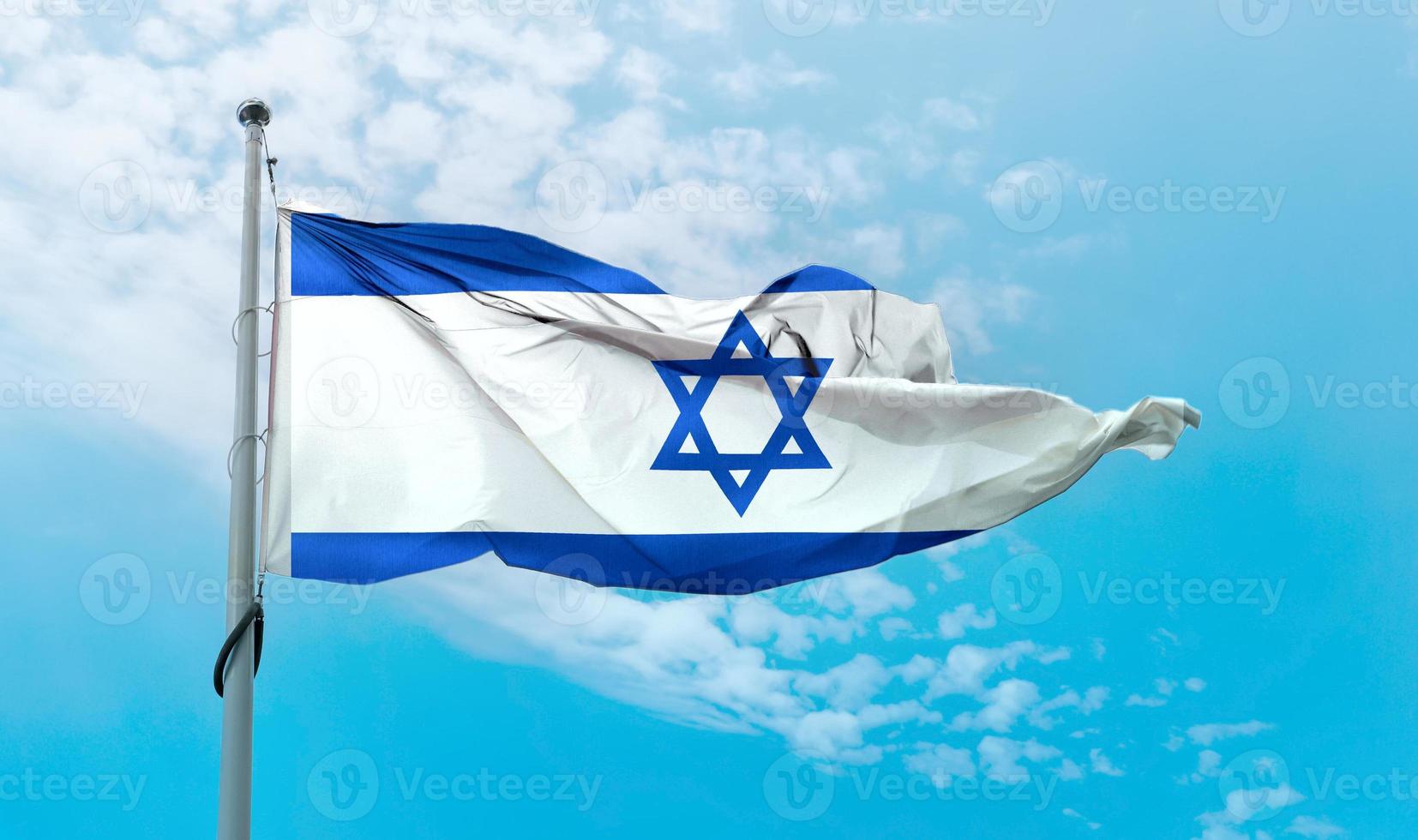 Israels flagga - realistiskt viftande tygflagga. foto