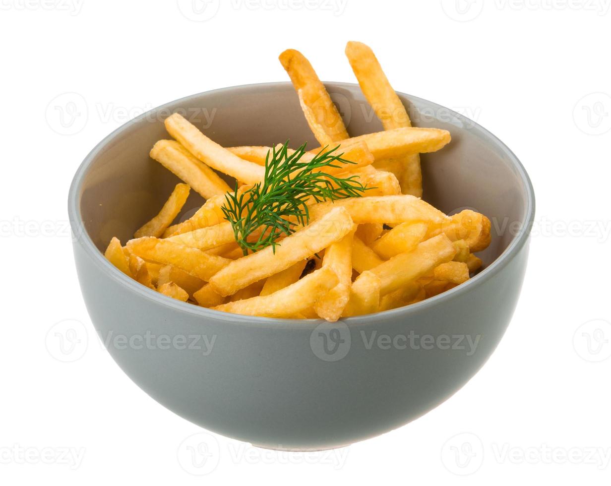 pommes frites i en skål på vit bakgrund foto