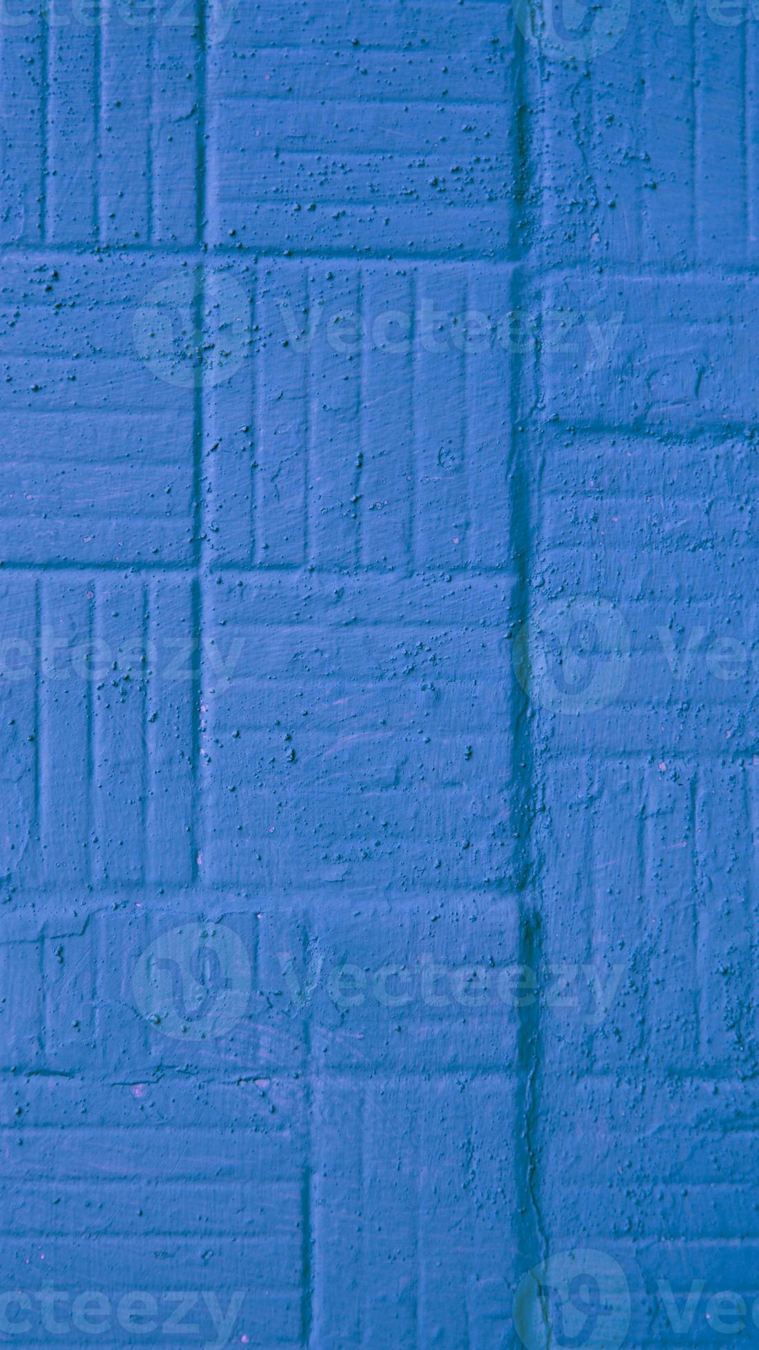 dekorativ vertikal blåmålad vägg med fyrkantig och remsor bakgrundsstruktur foto
