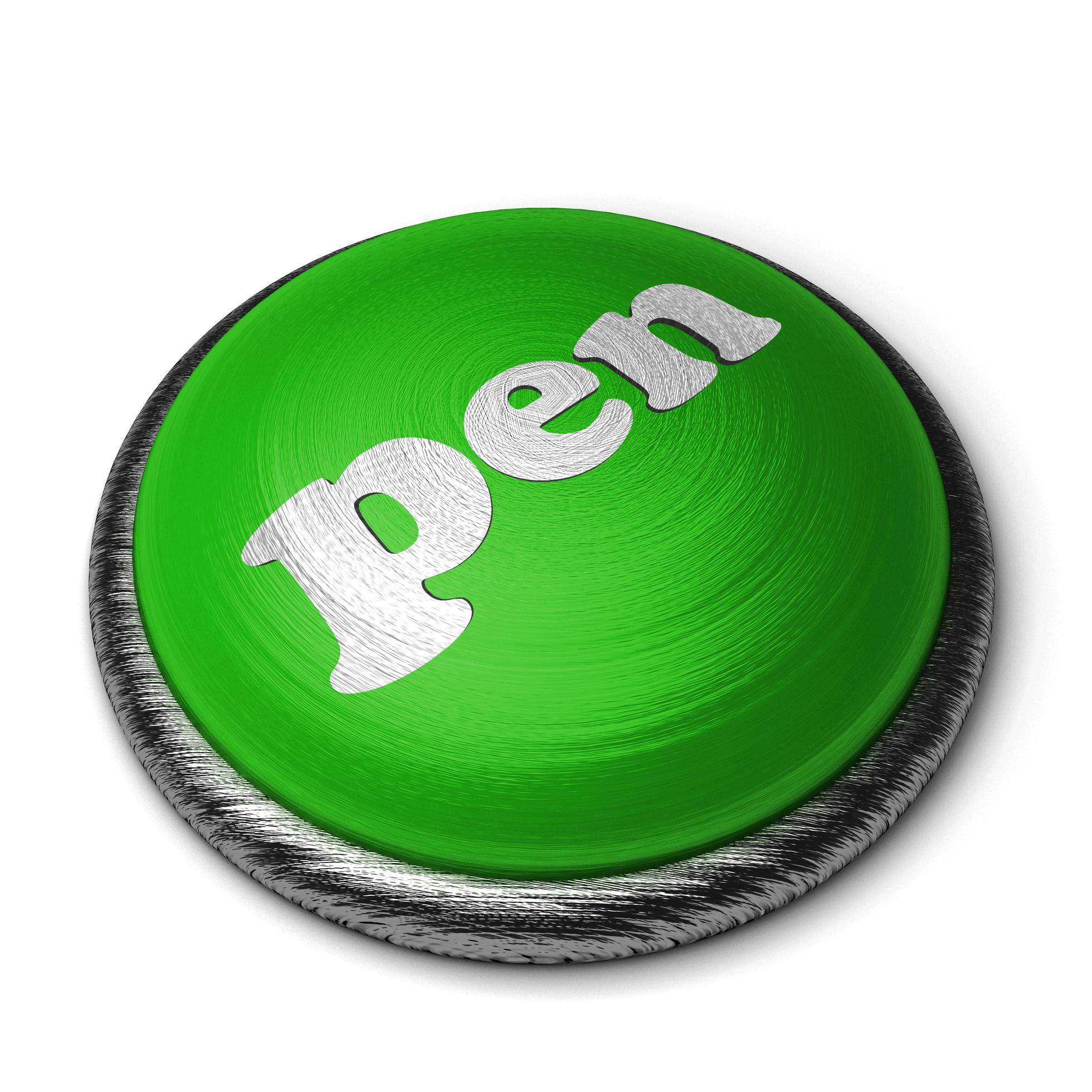 pennord på grön knapp isolerad på vitt foto