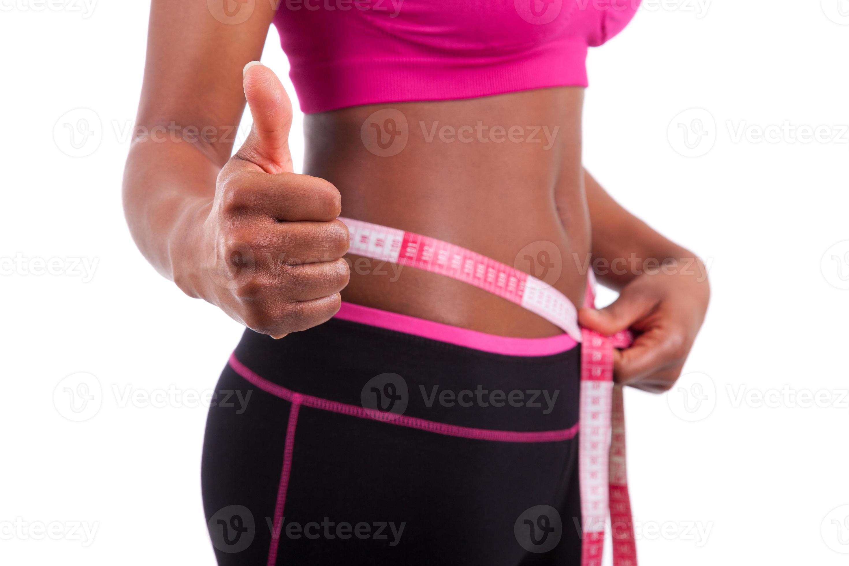 afrikansk amerikan fitness kvinna gör tummen upp foto